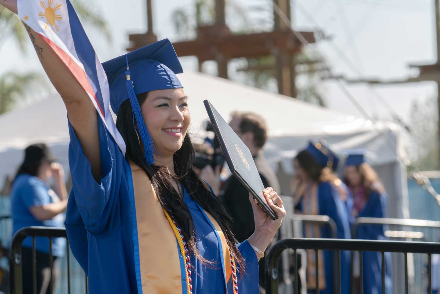 student with diploma