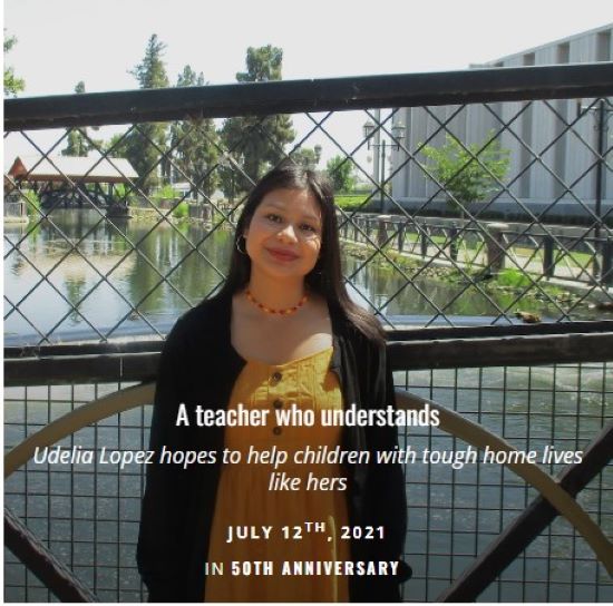 Woman standing on bridge over water
