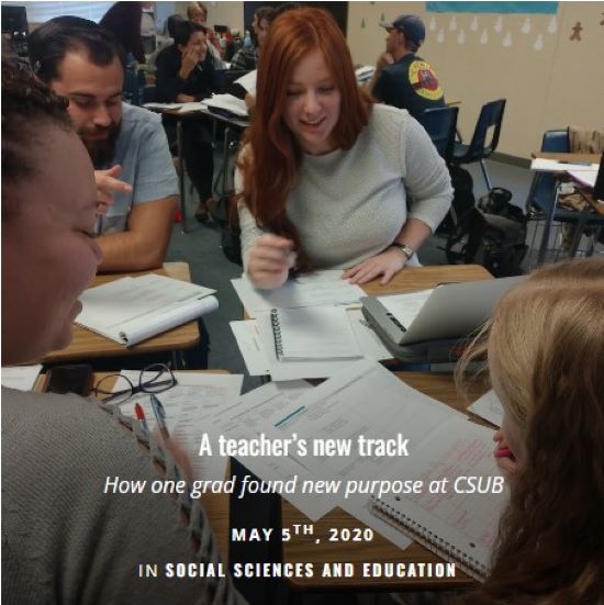 Group of people sitting at a table and looking at papers