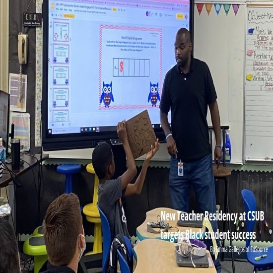 Teacher standing in front of students