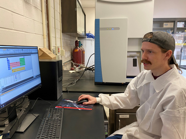 Student working in the CSUB Geochem Lab