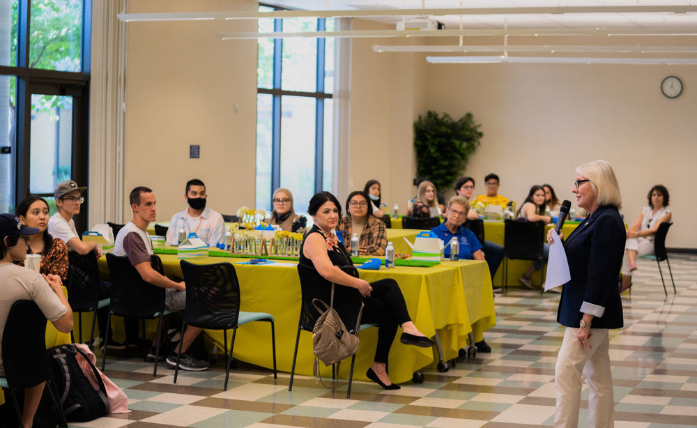 President Zelezny speaking in front of a crowd