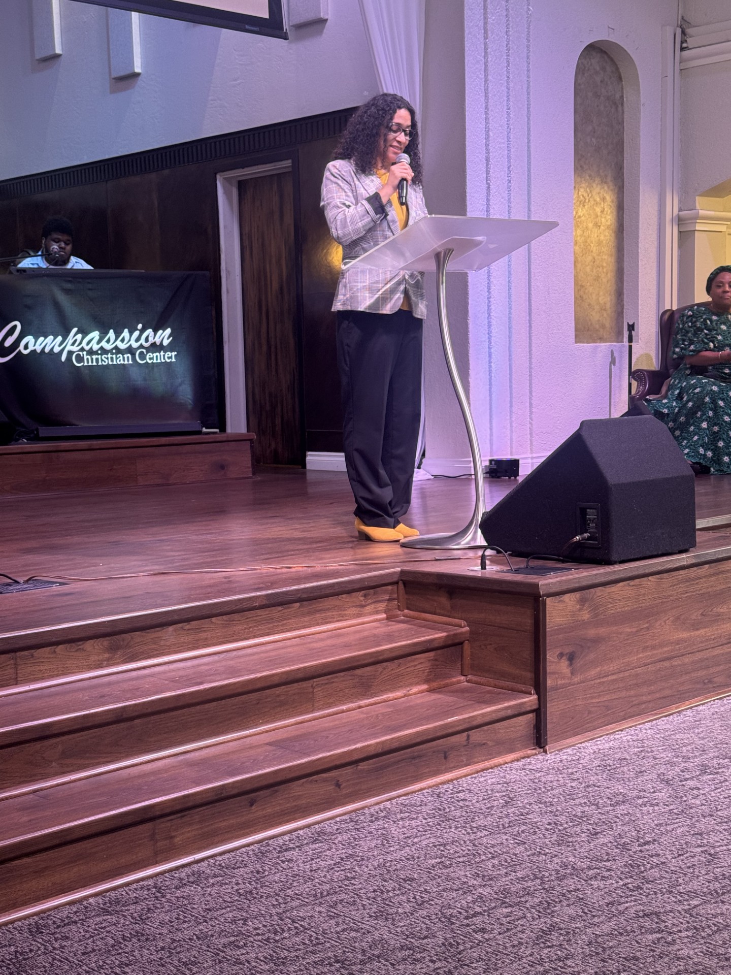 Dean Bozarth speaking at a podium